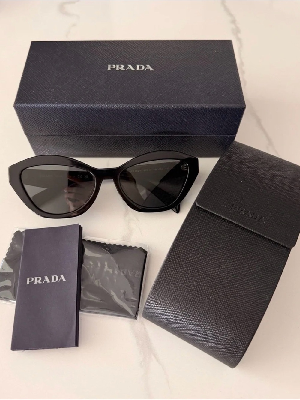 Prada Black Gloss Cat-Eye Sunglasses with Dark Lenses